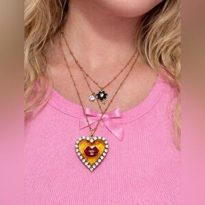 Betsey Johnson gold tone multi-charm heart necklace